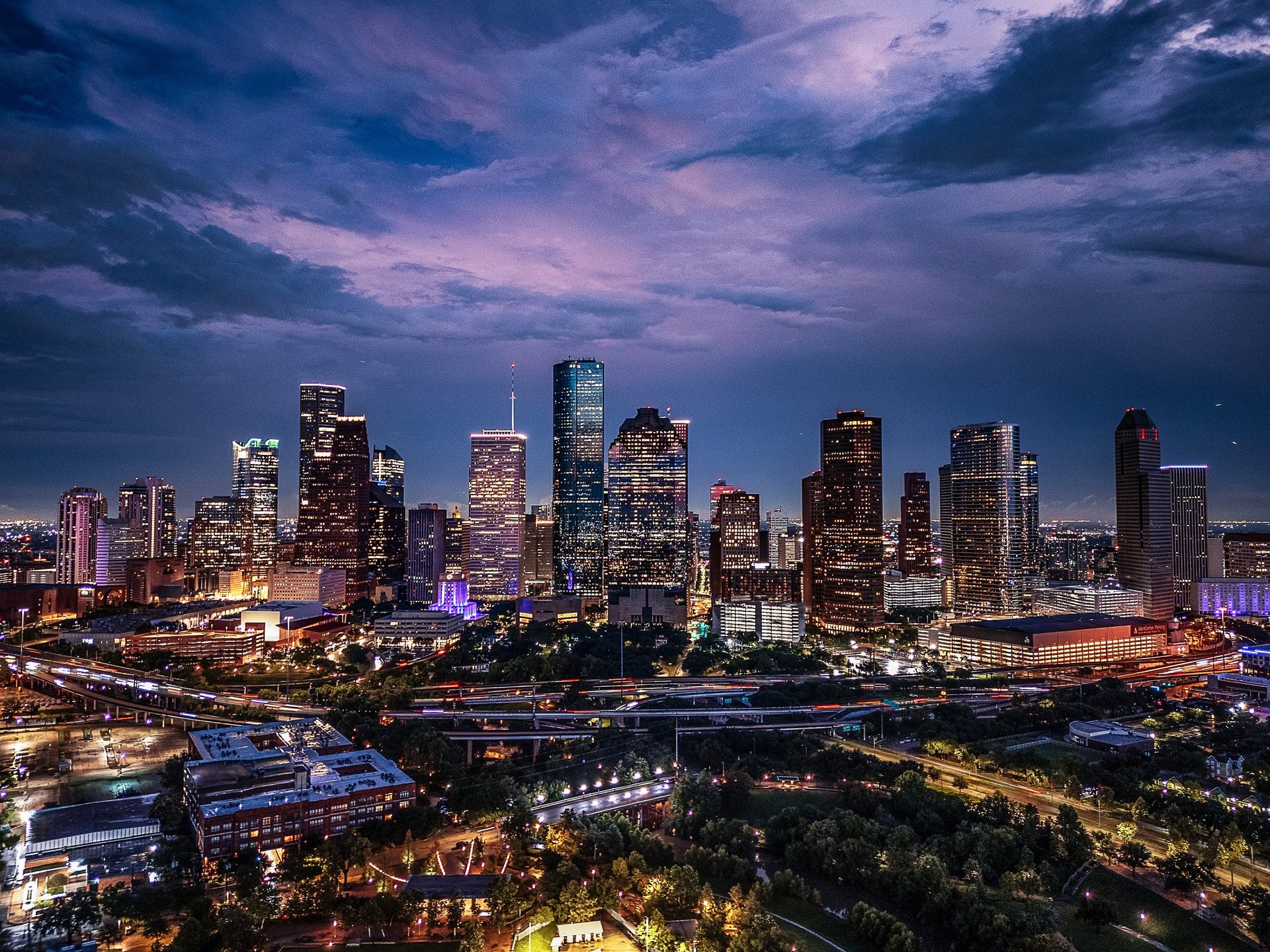 Downtown Houston skyline with Armor Plate Protection Services security guards