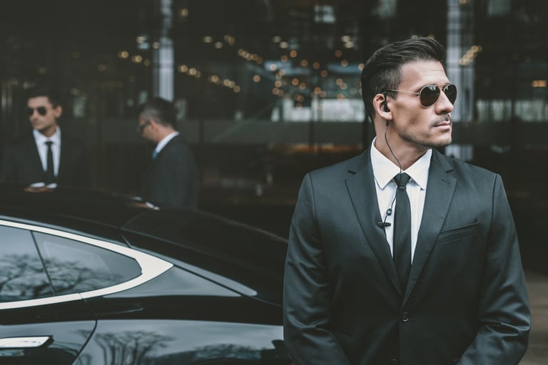 Professional bodyguard in suit providing executive protection